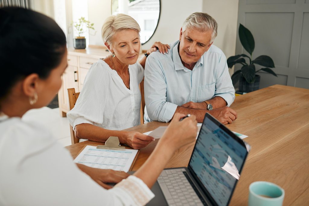 Family discussing finances and planning for their financial future