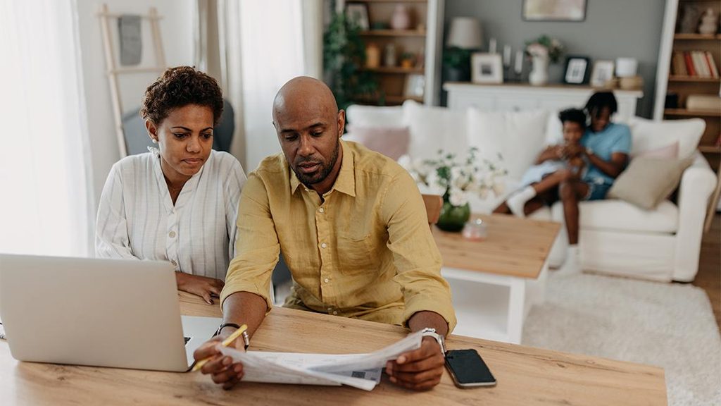 Family discussing finances and planning for their financial future